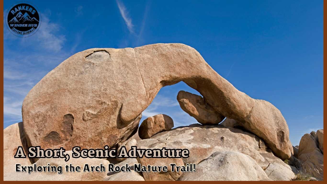 Natural arch formation on Arch Rock Nature Trail in Joshua Tree National Park with clear blue skies.