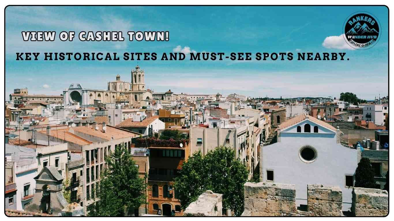 "A panoramic view of Cashel Town, showcasing historic rooftops and iconic architecture under a clear blue sky."