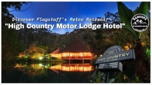 "High Country Motor Lodge nestled among trees at night, showcasing its retro charm along Route 66 in Flagstaff, Arizona."